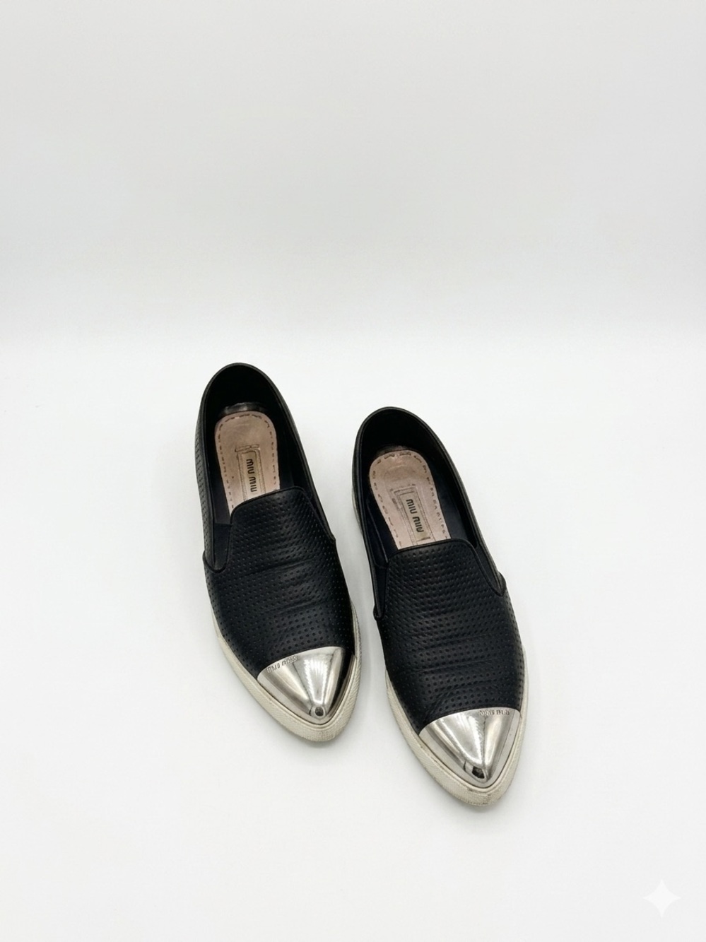 Miu Miu Black Leather Slip-On Sneakers with Silver Toe Caps